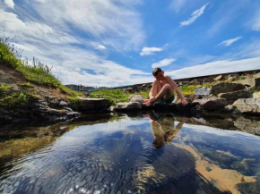 Hótel Laugarhóll with natural hot spring